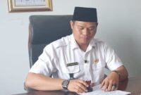 Poniman,SH. Kepala Desa Jatimulya Kabupaten Tangerang